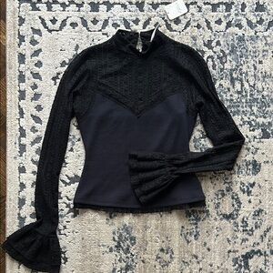 Elegant Black Lace Women's Top by Free People size XS